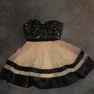 wore once for a sweet 15. Good condition.